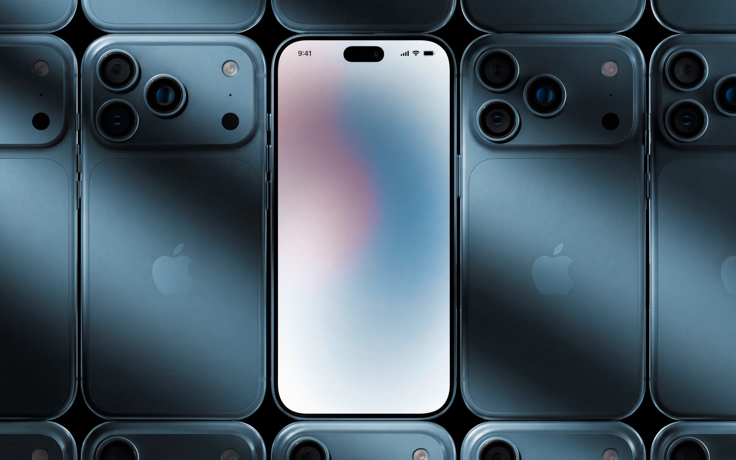 Rows of titanium iPhones seen from the back, with one turned face-up, recording a voice note in Murmr.